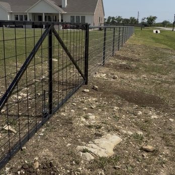 Welded metal fence and gate project by Minnis Builders Co.